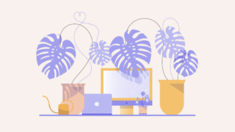 a computer monitor sitting on top of a desk next to a potted plant