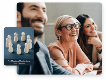 two women and a man are sitting together