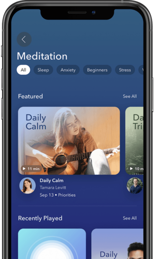 a cell phone showing the daily meditation app
