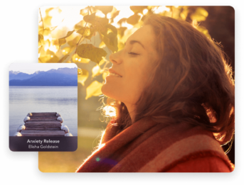a woman with her eyes closed standing on a dock