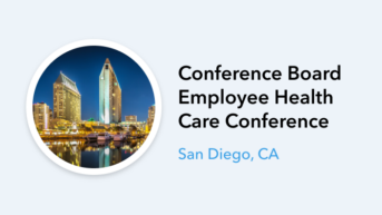 the conference banner with a photo of a city at night