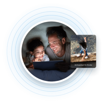 a man and a child are looking at a tablet