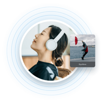 a woman with headphones on her ears