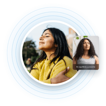 a woman with her arms crossed in front of a blue circle