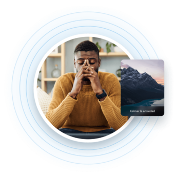 a man sitting in front of a laptop computer