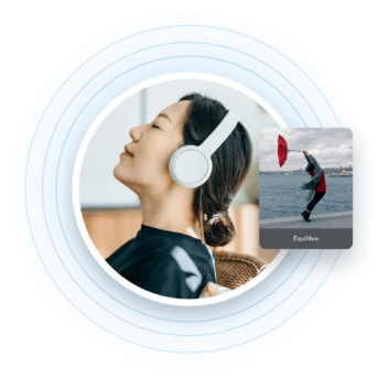 a woman with headphones on her ears