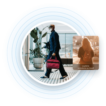 a man walking with a red bag in his hand