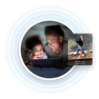 a man and a child are looking at a tablet