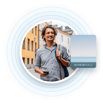 a man holding a cell phone in his hand