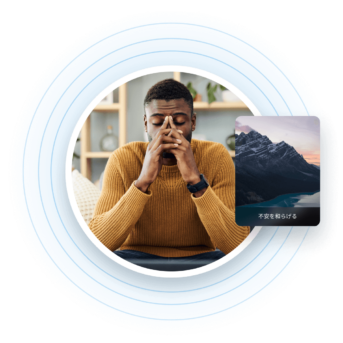 a man sitting in front of a laptop computer