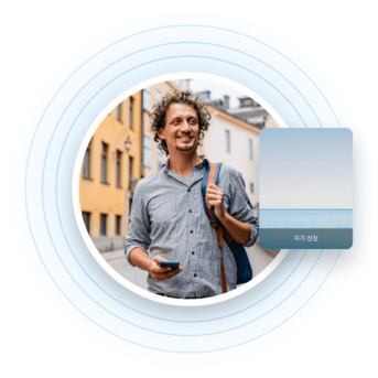 a man holding a cell phone in his hand