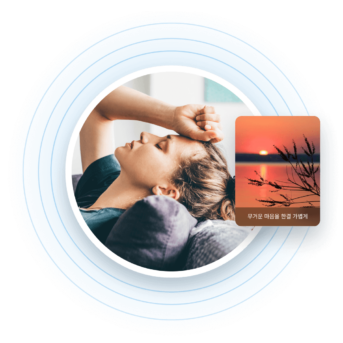 a woman laying down with her eyes closed and a credit card in front of her