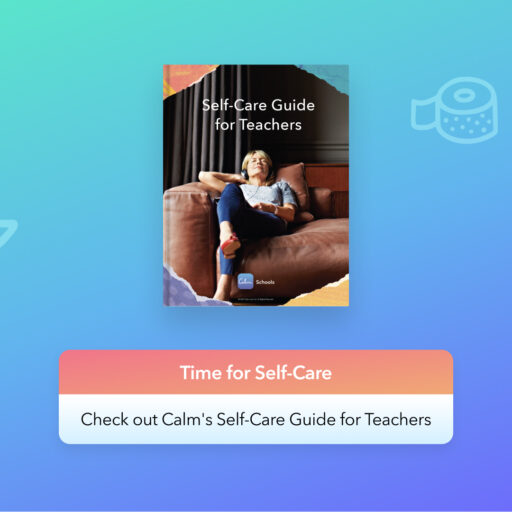 a woman sitting on a couch next to a book