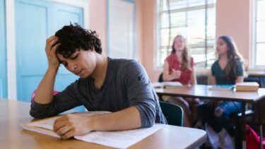 Teen at desk