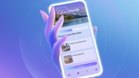 a person holding a cell phone in their hand