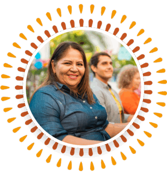 a woman standing in front of a group of people