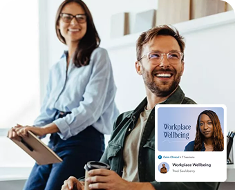 a man and a woman sitting next to each other