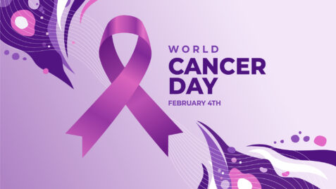 a purple ribbon for world cancer day