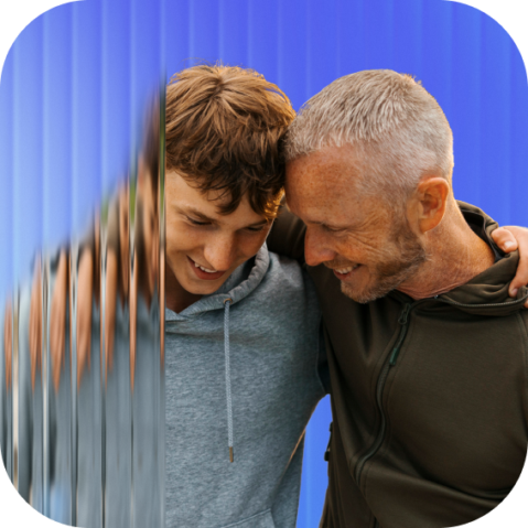 a man and a boy are looking at each other